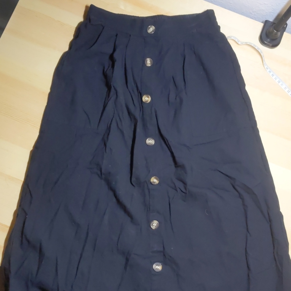 Black midi skirt with buttons